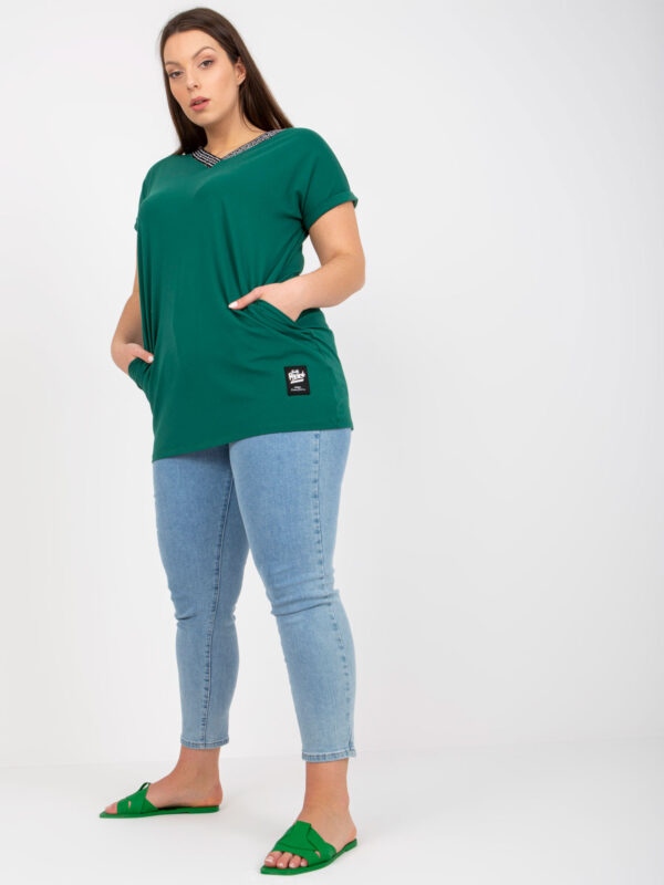 Dark green blouse of larger size with