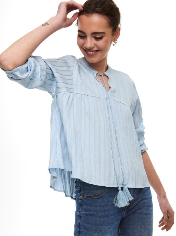 Light blue loose blouse ONLY