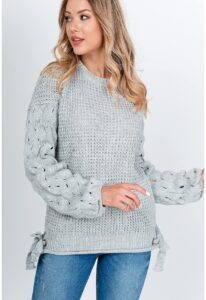 Women's knitted sweater with bows