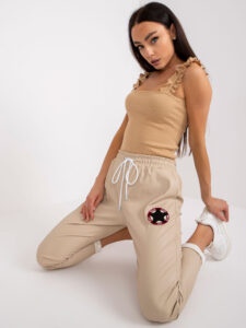 Beige trousers made of eco-leather with
