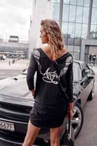 Fashionable black dress with wings