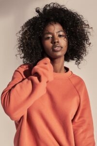 Orange sweatshirt made of recycled Perim