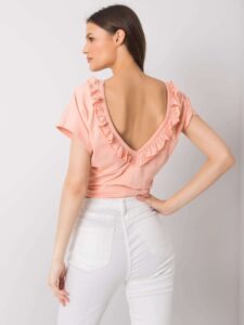 Peach blouse with neckline on