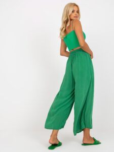 Green wide trousers made of