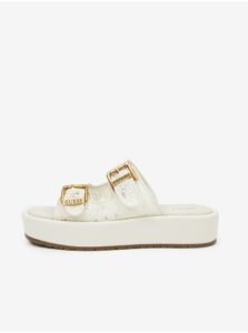White women's slippers on the Guess