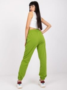 Green sports trousers with pockets
