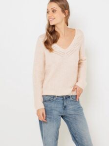 Cream sweater with clamshell neckline